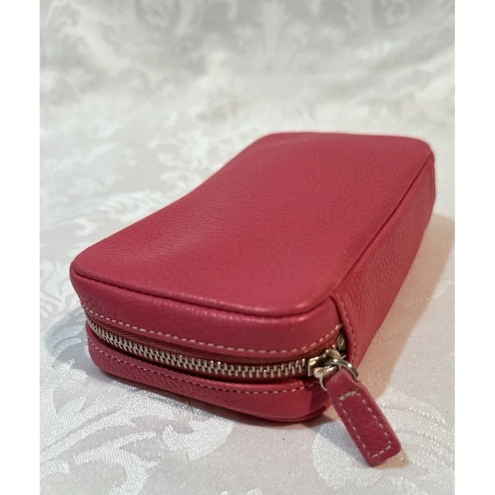 Coach hot pink zip wallet suede-lined multiple zipper compartments. 6